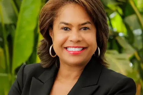 Woman in red lipstick smiling for professional photo