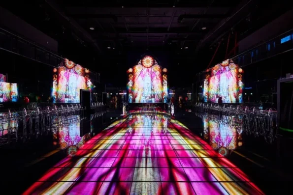 Light reflecting through pink windows in a museum