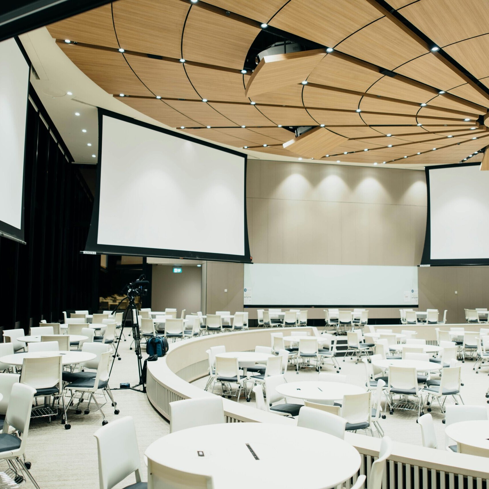 Indoor conference room with seats and projectors