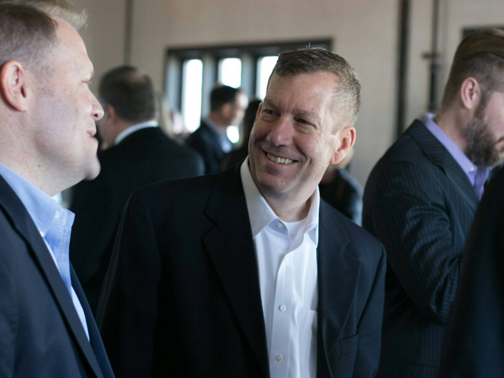 Men in suit at corporate event