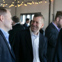 Men in suit at corporate event