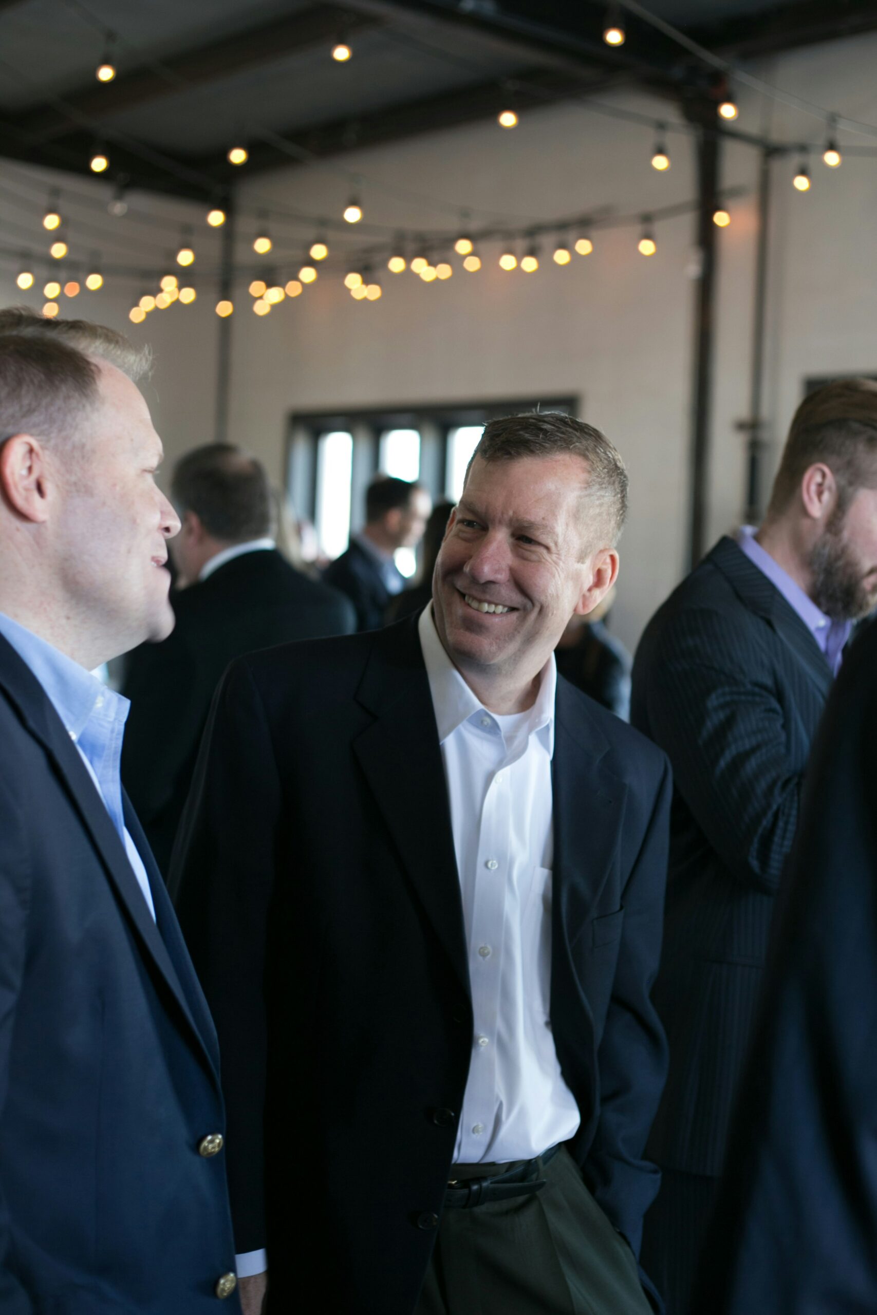 Men in suit at corporate event