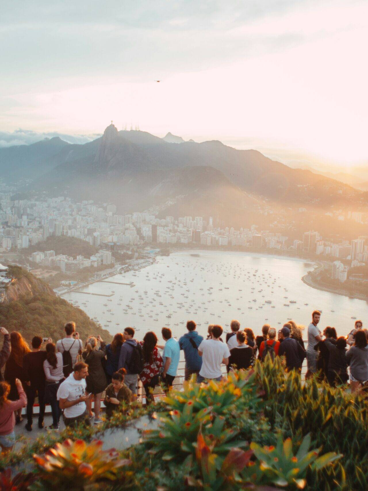A group of people attending a corporate event and enjoying the view