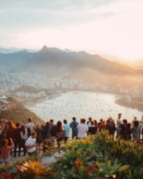 A group of people attending a corporate event and enjoying the view