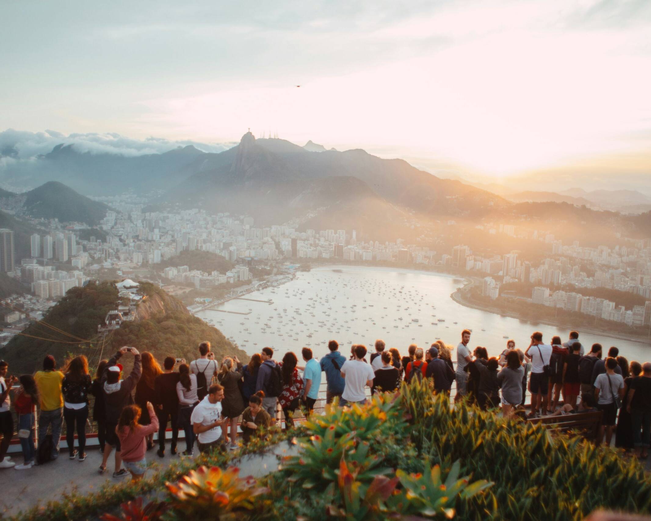 A group of people attending a corporate event and enjoying the view