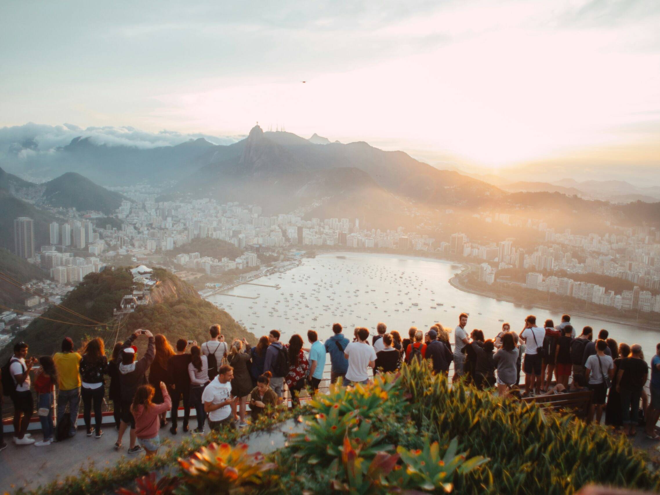 A group of people attending a corporate event and enjoying the view