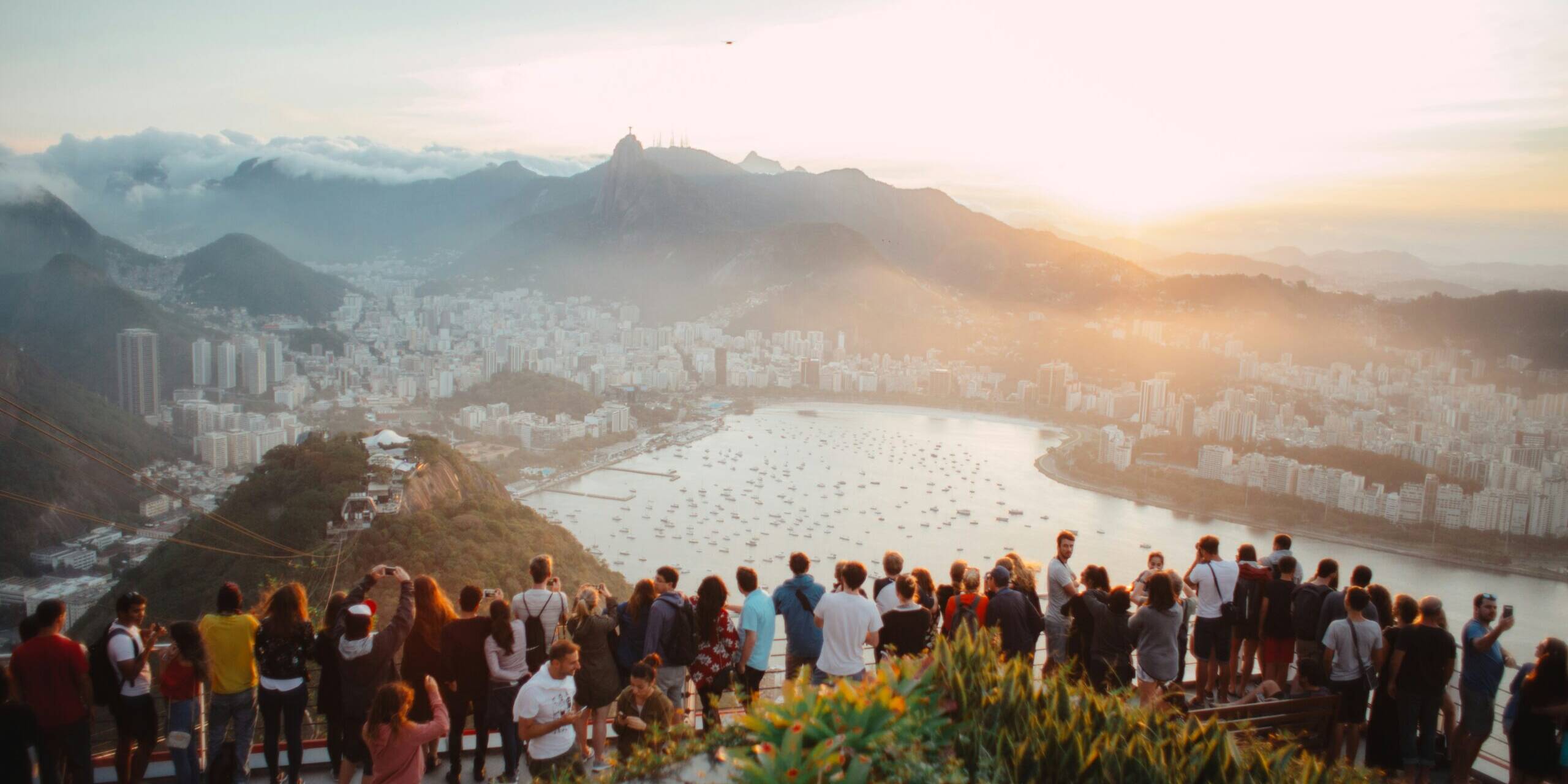 A group of people attending a corporate event and enjoying the view