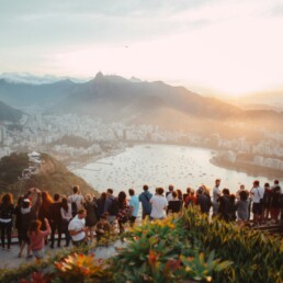 A group of people attending a corporate event and enjoying the view