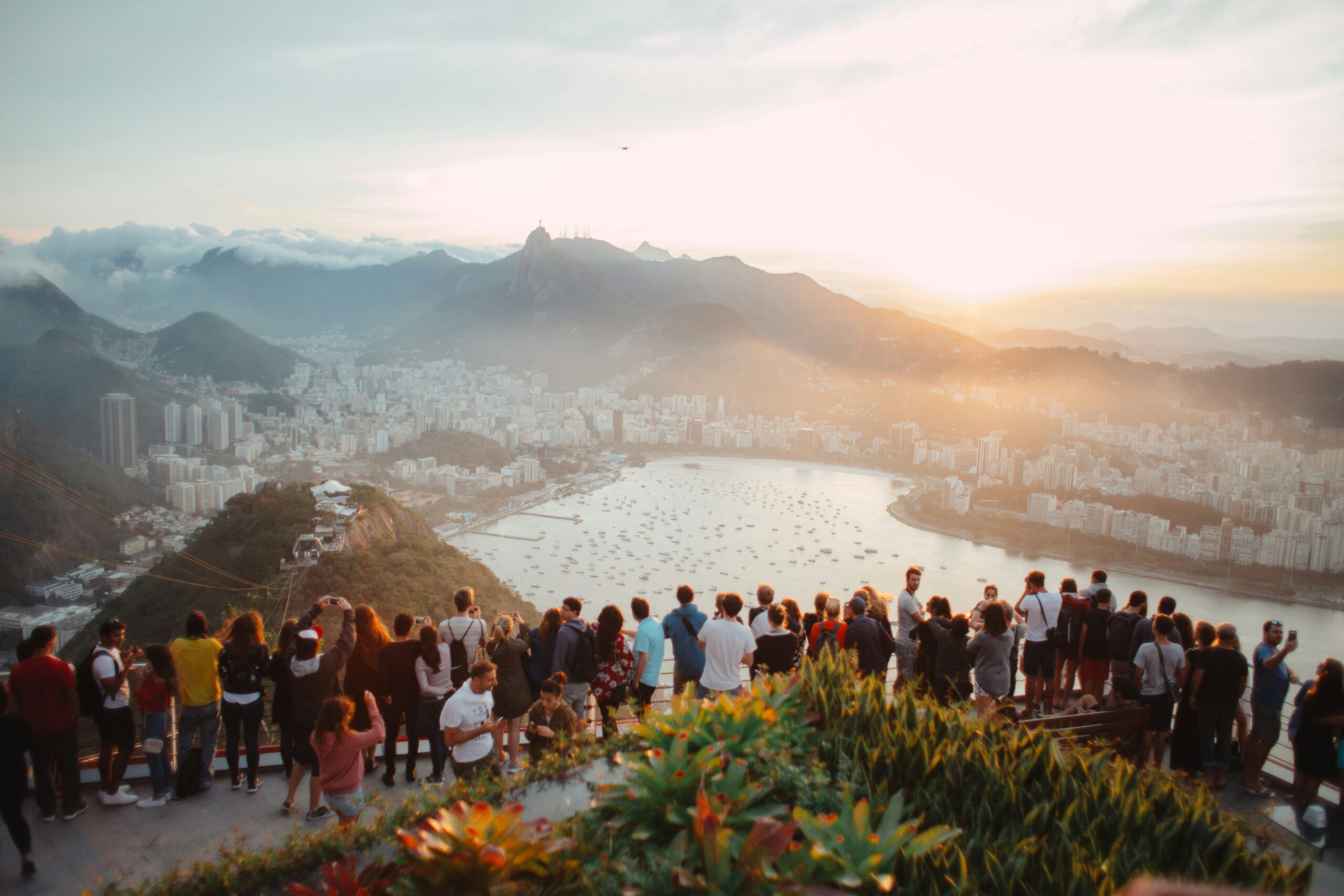 A group of people attending a corporate event and enjoying the view